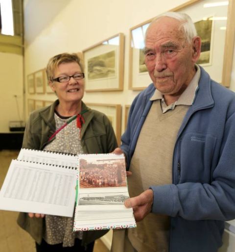 Julie Eagles, FJ Stories Coordinator and Tim Carlton, former Methods Engineer at Fletcher's and a key researcher in the course of the FJ Stories Project, with the staff list appealing for people (in an article in the Warrnambool Standard) to view it on-line or in person to check it's accuracy. Photo: Rob Gunstone.  