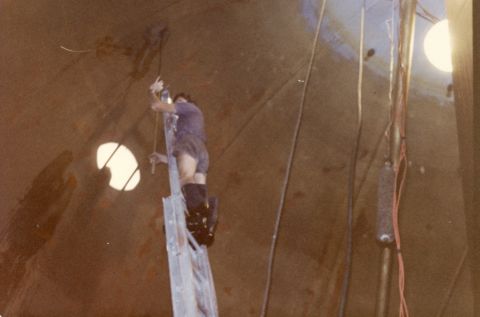 Gary Kelly washing down the inside of the Silver Ball.  The light is a reflection of sunlight from the manhole at the top of the ball.  Photo: Gary Kelly