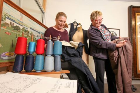 Tonia Wilcox and Julie Eagles search through Fletcher Jones artefacts, at the Warrnambool Historical Society, before the FJ Living Museum event. Photo: Warrnambool Standard 
