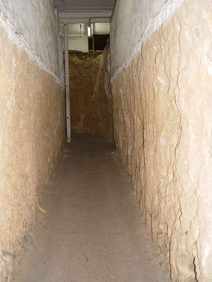 Exit tunnel carved in sandstone under the factory.  Photo: shared by Tim Carlton