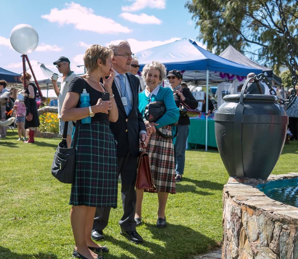 L-R Rena Cotter, Ralph and Joyce Jones in the FJ Gardens at the 2016 community picnic after the unveiling of the second FJ Story Panel.  Note Tonia Wilcox in the distant left hand of the photo in her Silver Ball costume!  Photo: Rosana Sialong