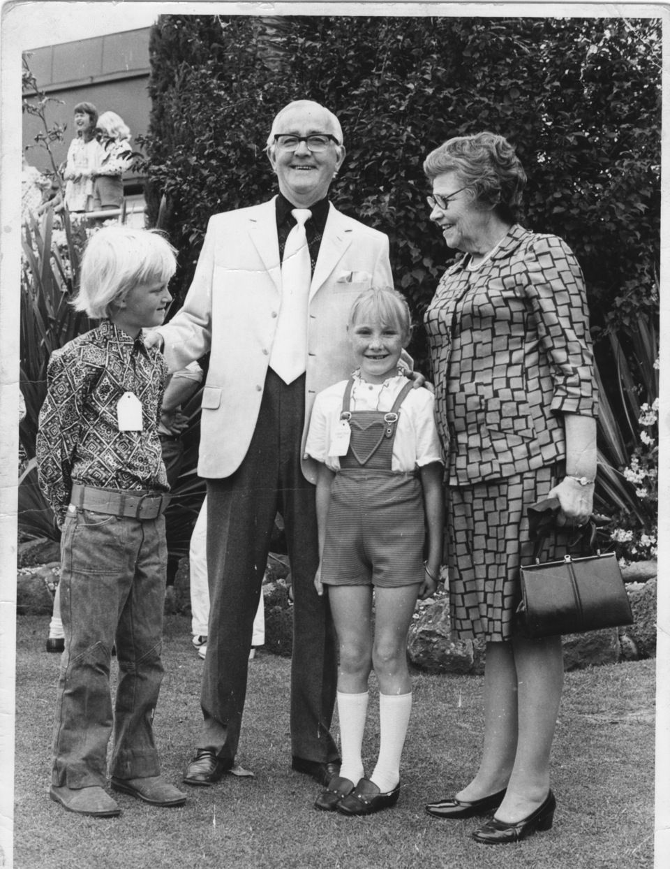 David Jones Jnr (left), Sir Fletcher Jones, Brenda Anderton and Lady Aida Jones at a 1972 Christmas Picnic in the FJ gardens.  Photo shared by Eleanor Anderton