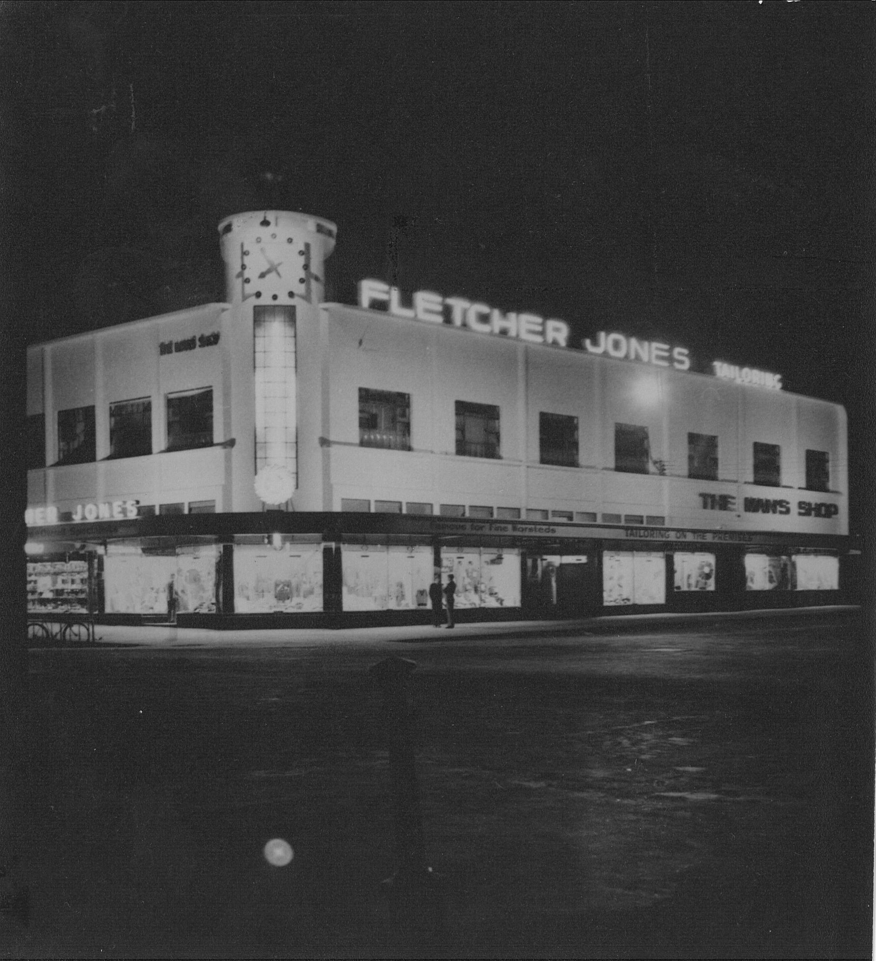 Man's Shop showing night lighting post-war. Photo: Jones Family Collection Man's Shop showing night lighting post-war. Photo: Jones Family Collection