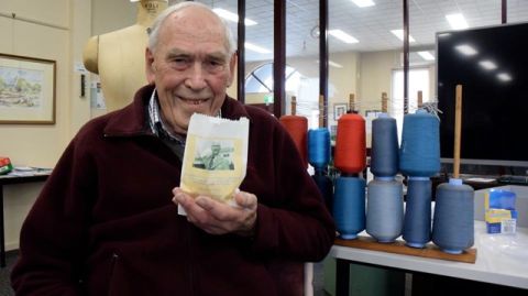 Tim Carlton looking pretty chuffed with his replica Balfours Bun and souvenir bag!  Photo: The Warrnambool Standard 