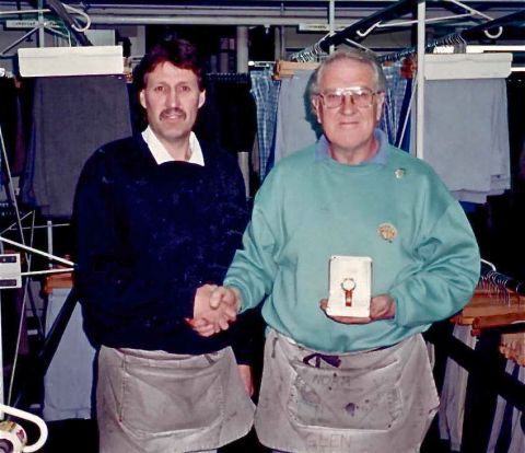 Tony Parkinson congratulates Glen Barker on his 40 year watch - Glen started work as a 14 year old in 1954 with Fletcher Jones. Shared by Glen's daughter Sharon McGowan    