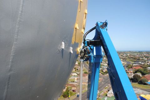 Changing from second rust treatment coat (yellow) to silver finish. Photo: Mark Rashleigh