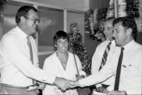 Graham Greave presenting a cheque from FJs to the W'bool Surf Life Saving Club. Photo: Jones Family Collection 