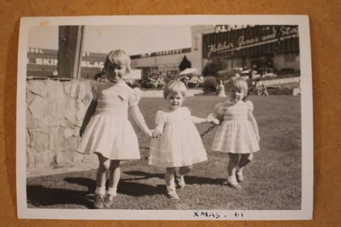 Grandchildren of Fletcher Jones - Anne Jones, Rena Cotter (nee Jones) and Susan Jones at a 1961 Christmas Party in the FJ gardens.  