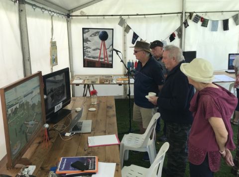 People enjoying the slide show and memorabilia in the Living Museum.  Photo: Tonia Wilcox