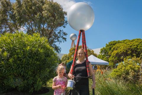 Tonia Wilcox, founder of the Save the Silver Ball and Fletcher's Gardens Facebook page, dressed as the Silver Ball with daughter Jenna,  fundraising at the 2016 community picnic in the FJ gardens for lighting up the silver ball on the city skyline.  Photo: Rosana Sialong 