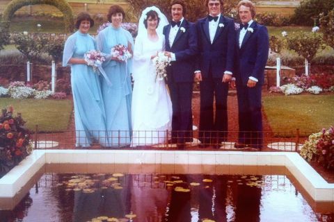 NOT the bridesmaid who fell in the pond! Photo of Glenda McGennan's bridal party in front of the pond in the FJ gardens.  