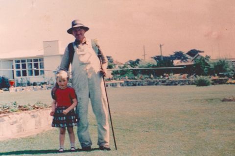 Marg O'Connor (nee Dorian) with Benny Hose in the FJ gardens where she lived as a child in one of the three staff houses.  Photo: Marg O'Connor 