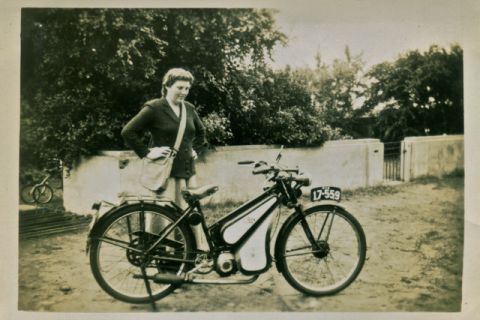 Claire with the two stroke motorbike she rode to work at FJs in the 50s.  Photo: Claire Doecke album