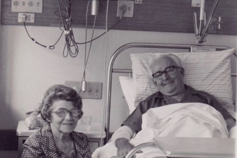 Fletcher Jones with his second wife, Aida, by his side during a hospital stay near the end of FJ's life.  Photo shared by Marg O'Connor